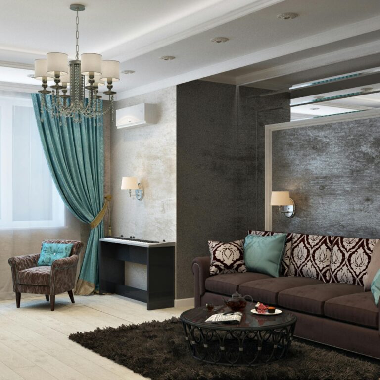 Luxurious modern living room with chandelier, sofa, armchairs, and stylish decor.